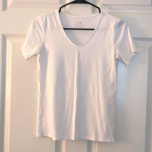White tee size XS.